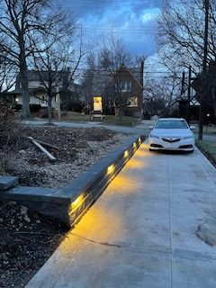 New driveway wall with inset lights